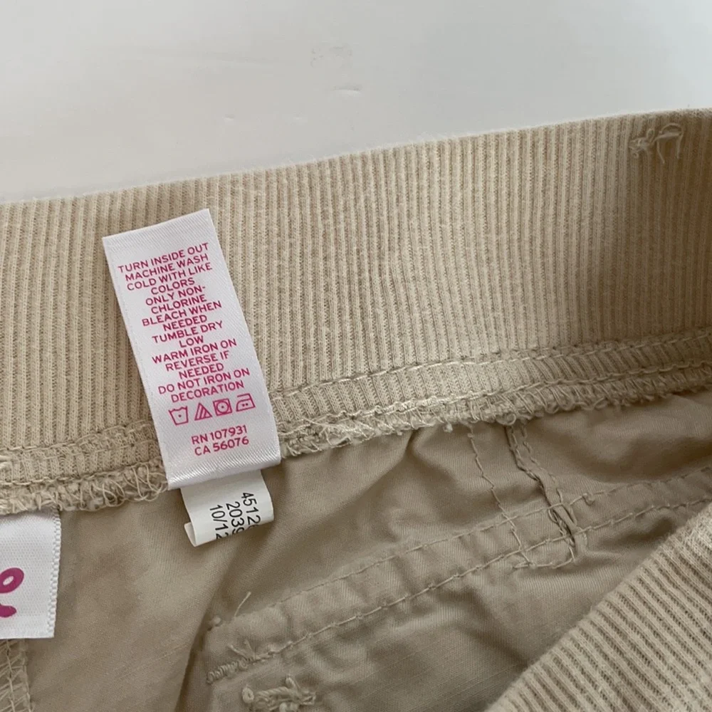 Justice cream crop pants youth size 14 - Can wear 3 different ways!